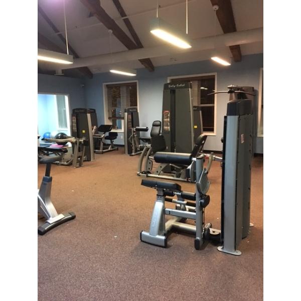 A gym with a wide selection of new and remanufactured gym equipment.