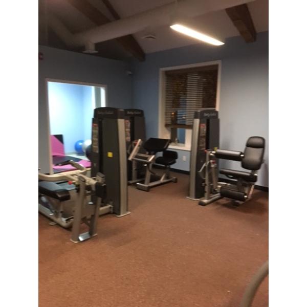 A gym with a wide selection of new and remanufactured gym equipment.