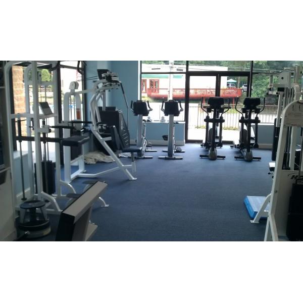 New exercise room with a variety of new and remanufactured gym equipment.