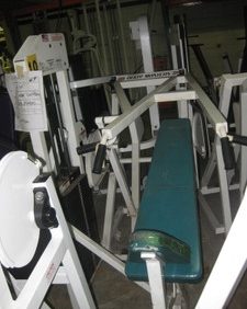 A gym stocked with a diverse range of new and Body Masters Incline Press - Remanufactured gym equipment.