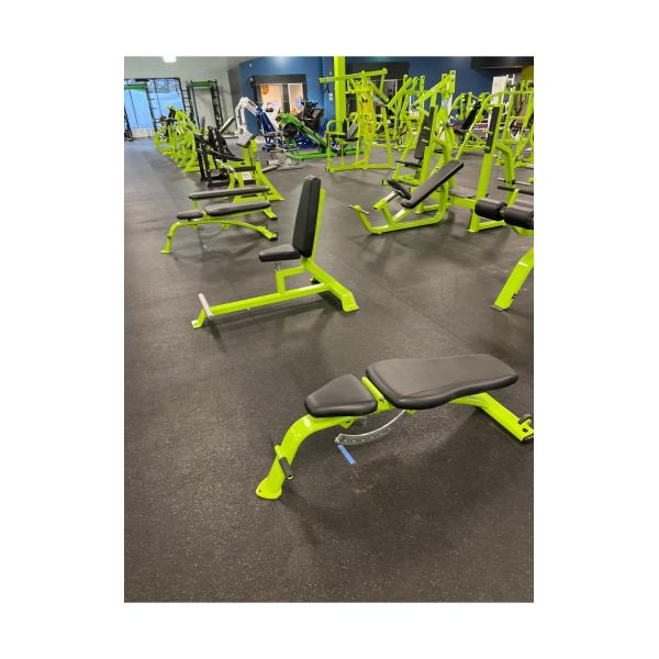 A group of New & Remanufactured Gym Equipment in a gym.