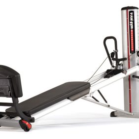 A new Total Gym Power Tower Demo with a bench on it.