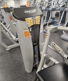 A gym equipped with a variety of new and remanufactured machines and equipment.