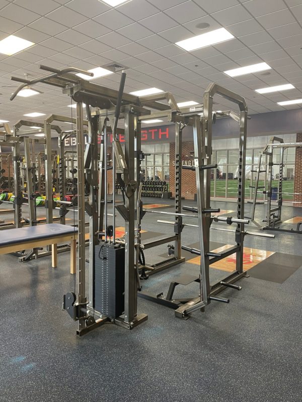 A gym with a lot of new and remanufactured equipment in it.