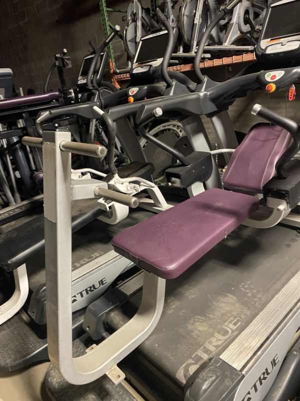 A group of The Abs Co. The Abs Bench - As Is Functional, new and remanufactured gym equipment, in a gym with purple seats.