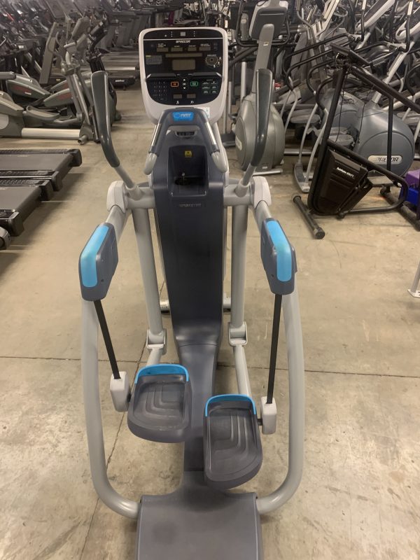 In a gym filled with various exercise equipment, the Cybex 626 Arc Trainer - As Is Functional stands out, offering a premium workout experience.