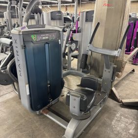 The Life Fitness Signature Ab Crunch in black, priced at $1995, features a seat with arm supports for upper body workouts and ab crunch exercises. It complements other Life Fitness machines in the gym, enhancing your fitness experience.