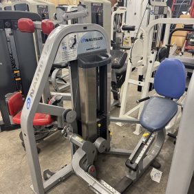 The Nautilus Nitro Plus Seated Calf - As Is Functional machine includes an adjustable seat and foot platform, making it a perfect addition to diverse gym equipment.